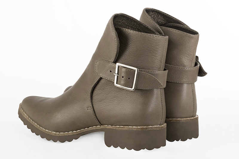 Women's taupe brown elegant ankle boots, with buckles at the back. Round toe. Thick rubber soles - Rear view